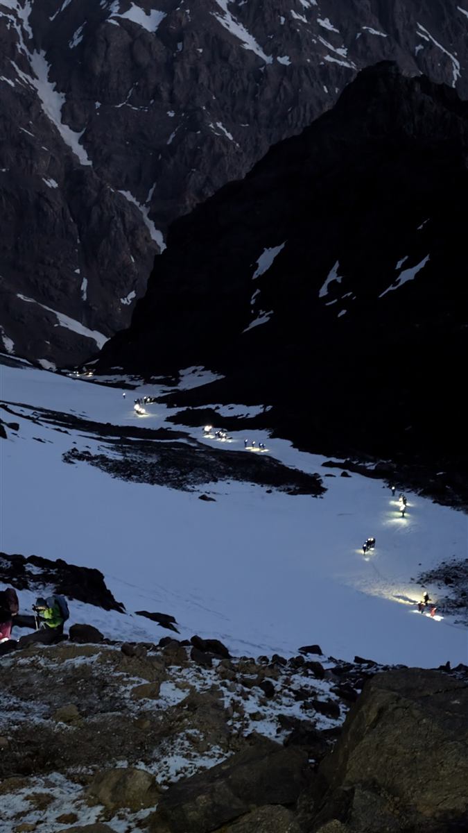 A line of headtorches making the night ascent